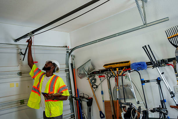 Professional Garage Door Panel Replacement technician working in Louisiana, MO